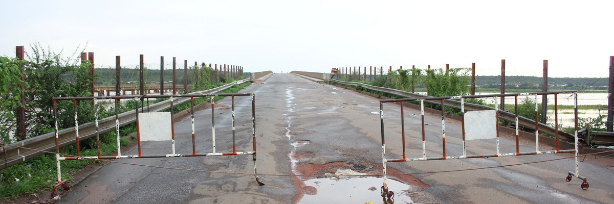 A barrier installed at the beginning of a bridge crossing the Niger River, as seen from Benin.